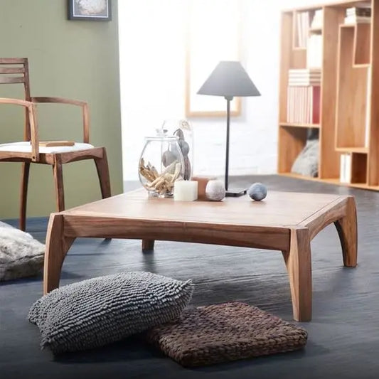 A square-shaped T-Rex Squiral Coffee Table made of Sheesham wood with knockdown legs.