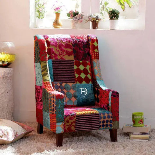 A colorful patchwork fabric kids sofa made with Sheesham wood.