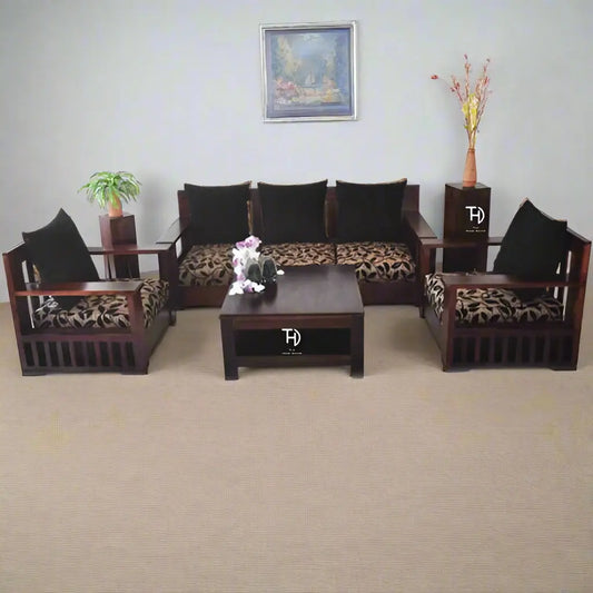 A five-seater Massive Sofa Set made of Sheesham wood with patterned fabric upholstery, displayed with cushions.