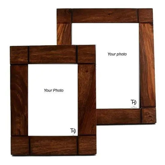 A set of two brown sheesham wood photo frames with a plain design, featuring a space for a photo insert.
