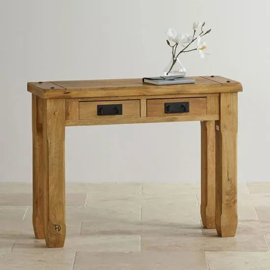 A rectangular console table made of mango wood with two drawers and metal handles.