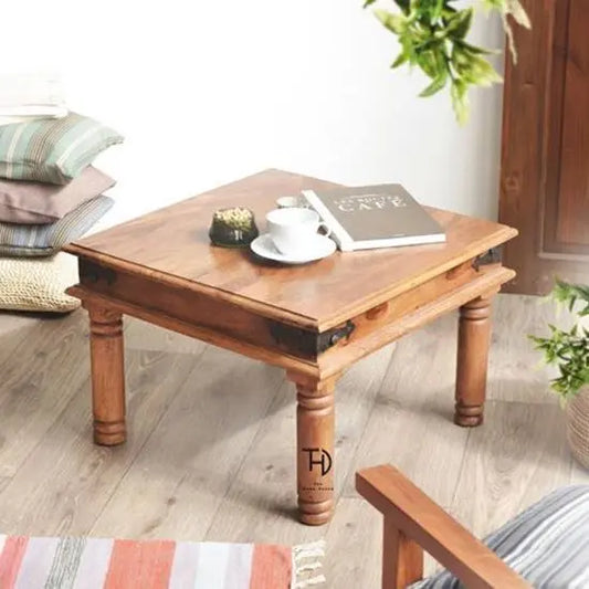 A square-shaped vintage side table made of solid Sheesham wood with a square tabletop.