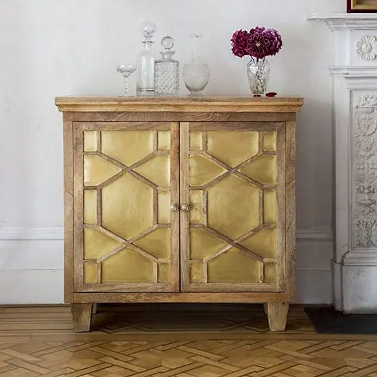 Two door cabinet with brass and mango wood. Best for storage in living room or dining room.