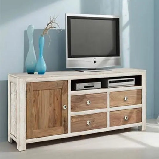A white Penguin TV cabinet made of solid sheesham wood with one door, four drawers, and an open shelf, with a flat-screen TV on top.