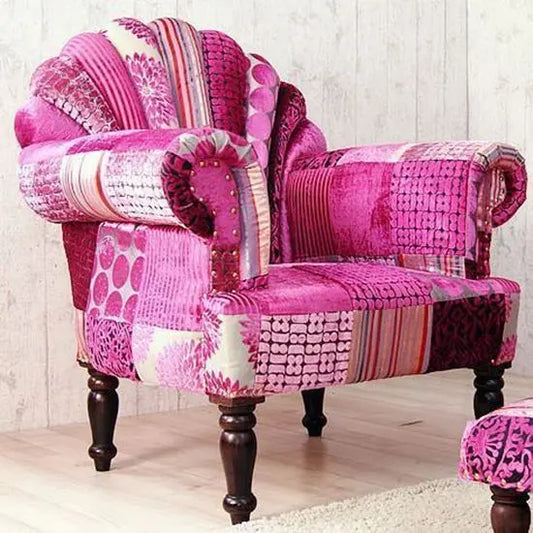 A peacock pink sofa with a vibrant backrest and multicolored fabric, hand-made and manufactured in solid Sheesham wood with a walnut finish.
