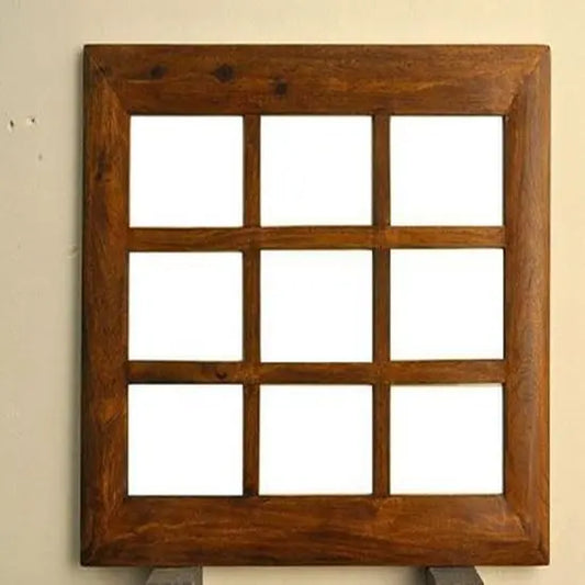 A wooden photo frame with a nine-window design, crafted from Sheesham wood, with a rich honey finish.