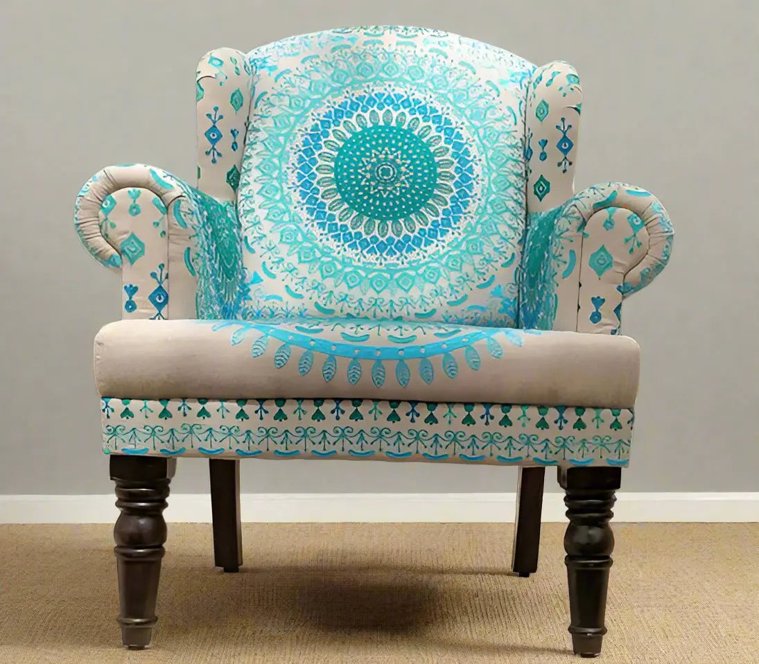 Decorative armchair with blue and white pattern on a plain background