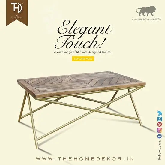 A rectangular Marbi Epoxy Coffee Table with a herringbone pattern on the top, crafted with mango wood and epoxy, and an iron metal base painted in golden color.