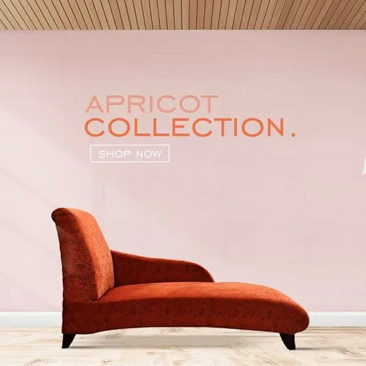 A red upholstered Erica Lounger.