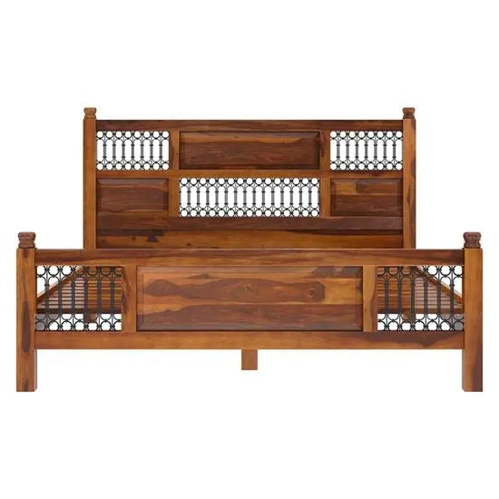 Without storage vintage wooden bed frame with a headboard and footboard.
