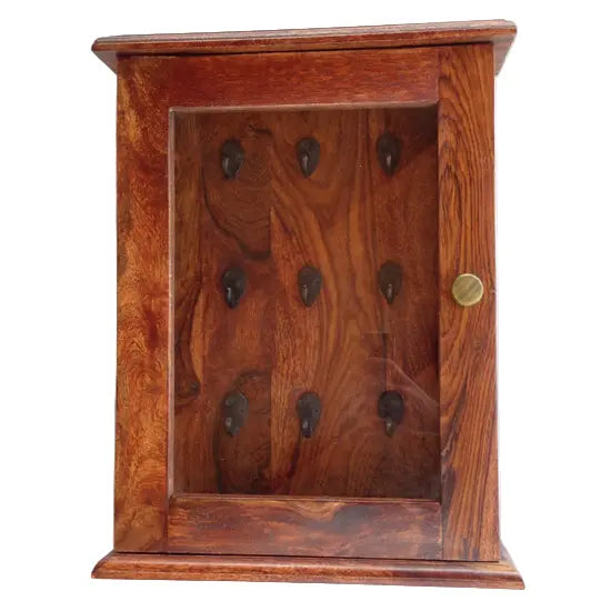 A wooden key hanger with nine holes for hanging keys, featuring a brown finish and a knob on the door.