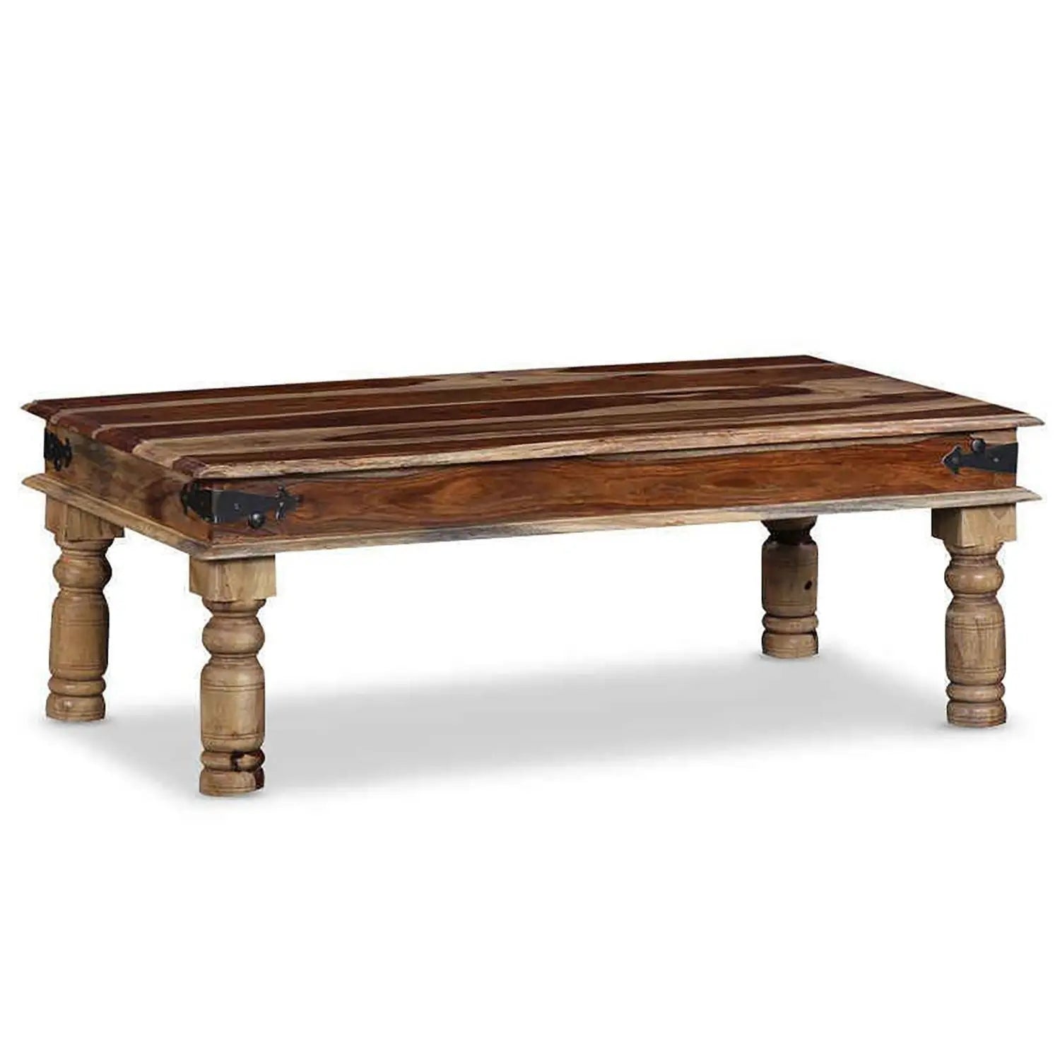 A rectangular wooden coffee table with turned legs and metal accents at the corners.