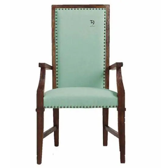 A wooden chair with armrests upholstered in green fabric, featuring a walnut finish.