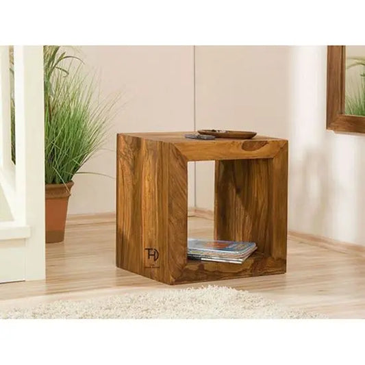 A Cube Side Table made of sheesham wood with a natural finish.