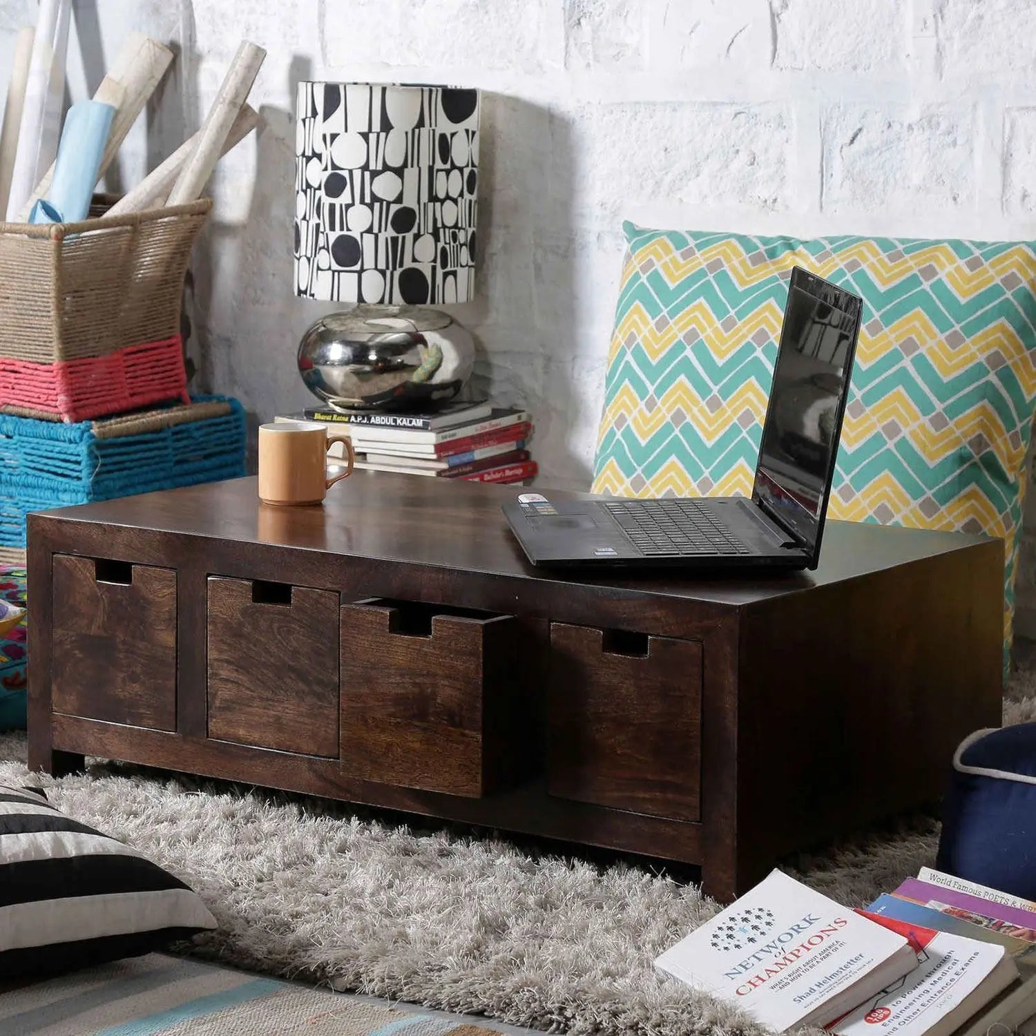 A rectangular brown wooden coffee table with storage compartments.