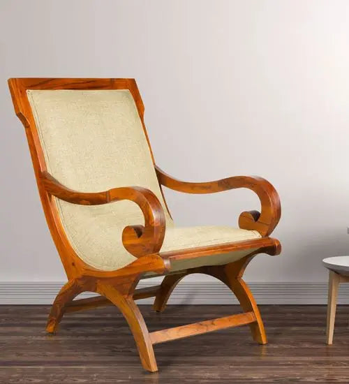 A Rambo Relax Chair with honey finish and cream jute fabric upholstery, handcrafted from Sheesham wood.