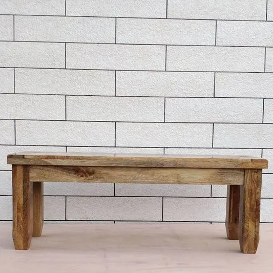 A three-seater dining bench made from mango wood, Modern and straight line design.