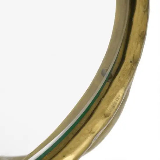 Round shaped one small shelf  Hammering Side Table with a hammered finish golden color metal base and a clear glass top.