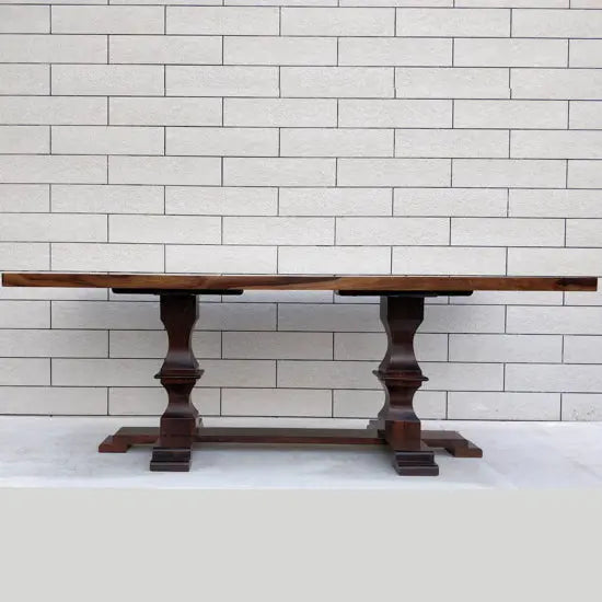 Dining table with two legs.