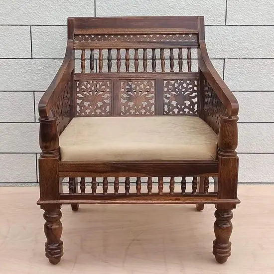 A vintage style sofa chair with natural stain finish on Sheesham wood.