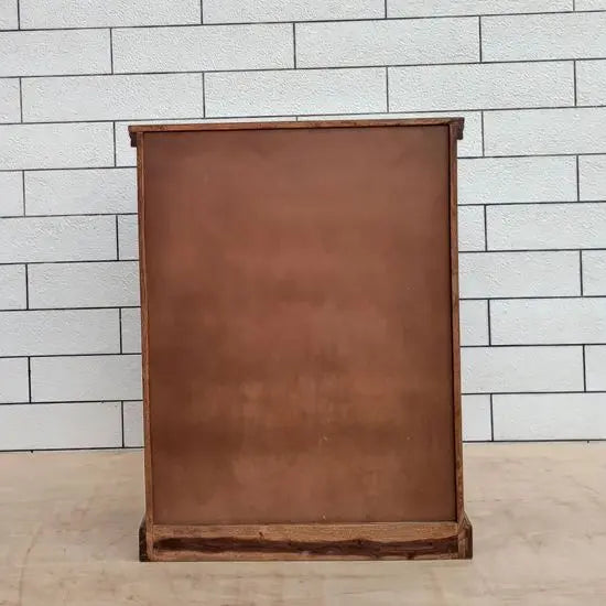 Back side view of wooden shoe rack