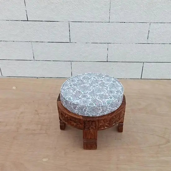 Hand carved round wooden stool