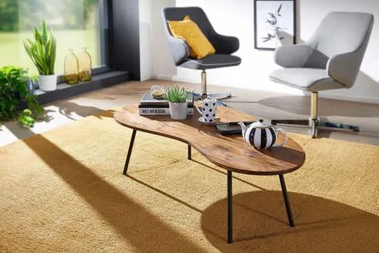 A sleek designer coffee table made of Solid Sheesham wood with metal legs for living room.