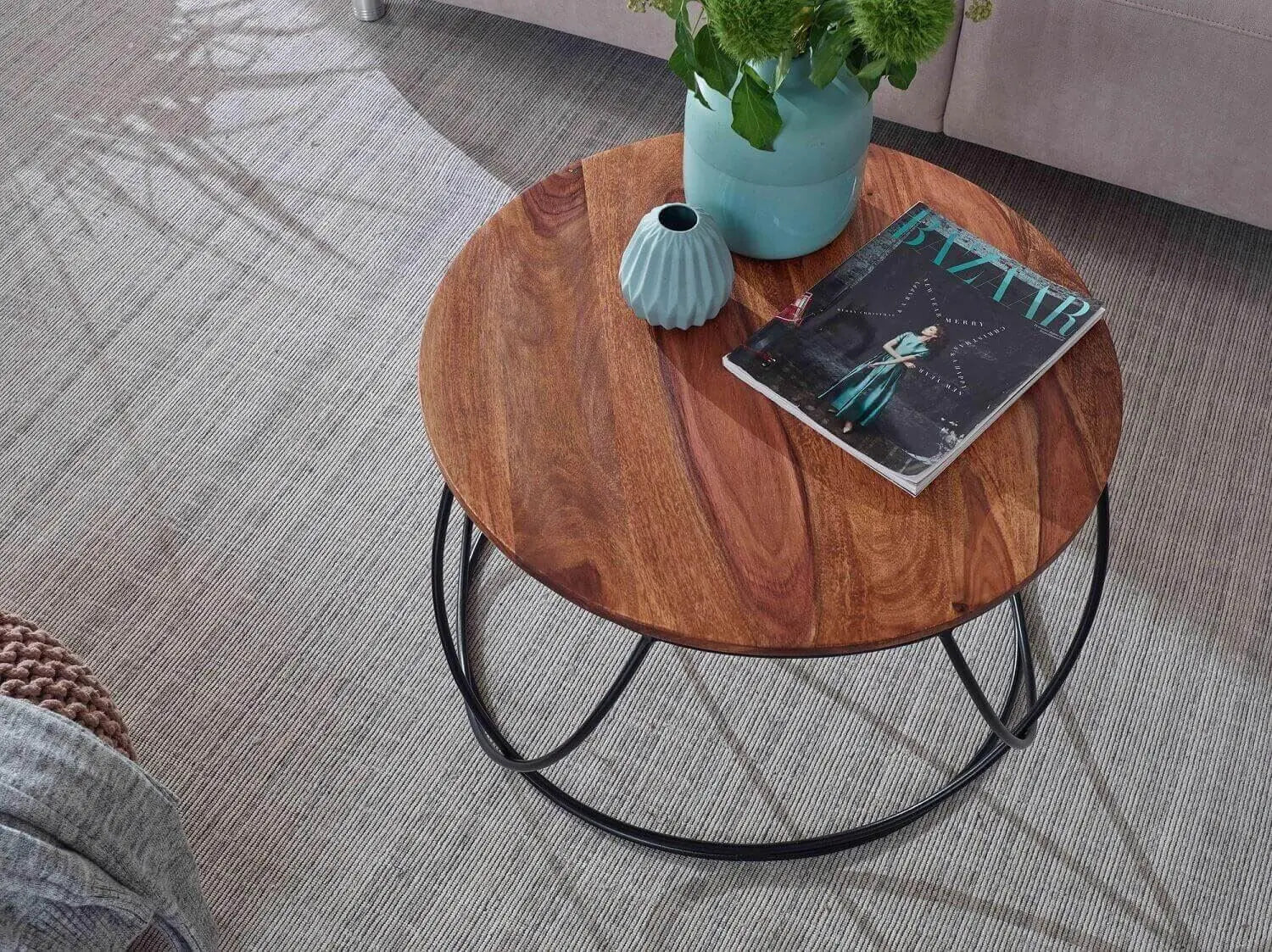 Solid wood Round shape Ring coffee table with a black metal base.