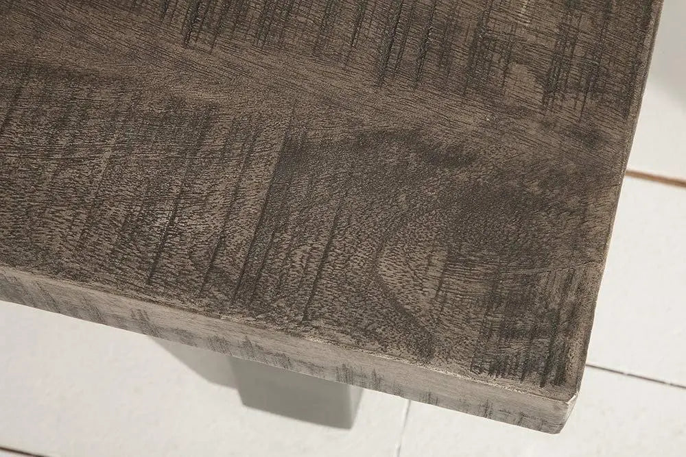 Mango wood and metal frame rectangle shaped dark jett coffee table.