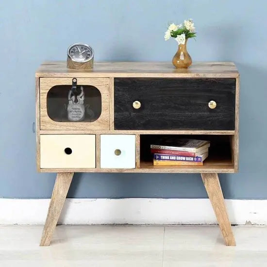 A wooden sideboard with a mirrored door. The sideboard has a black and beige color scheme.