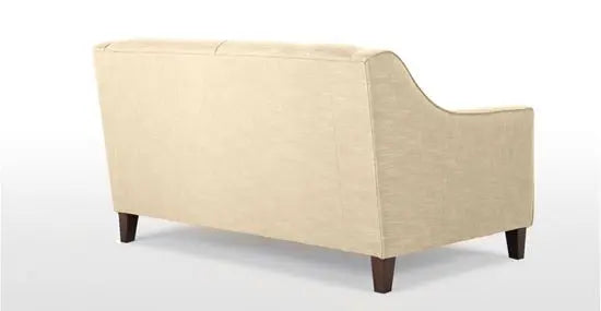 Two-seater sofa featuring a fabric upholstery, two cushions, and wooden legs.