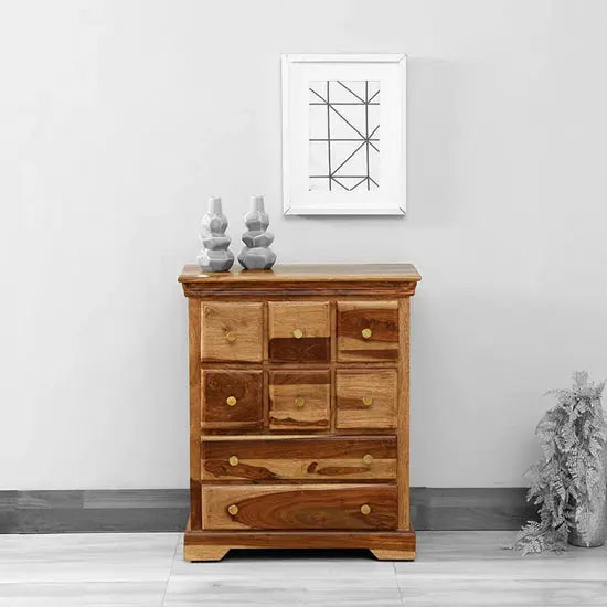 Cabinet with multiple drawers for storage of small things.