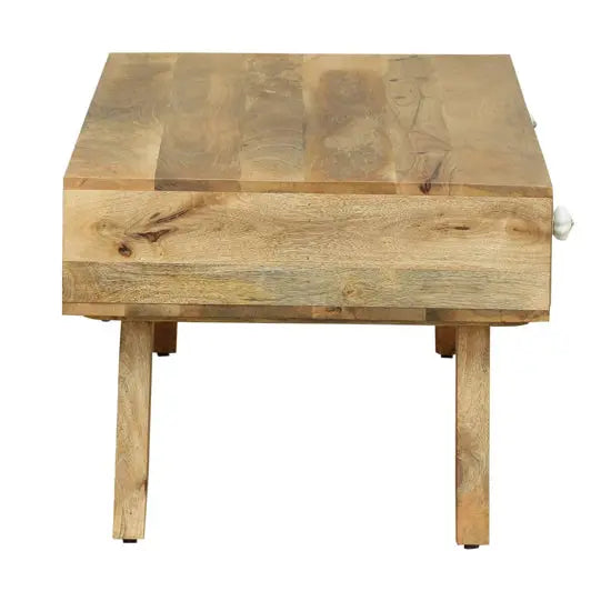 Solid mango wood rectangular Quatro Coffee Table with multicolored drawers and open shelves.