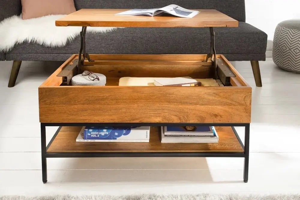 Mango wood and Metal Frame Ama lift on coffee table with lift-top design in a living room setting.