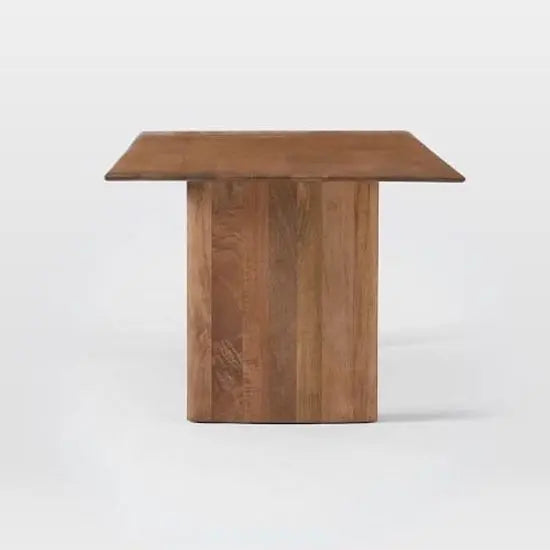 A rectangular shape Modern dining table with two benches made in solid mango wood.