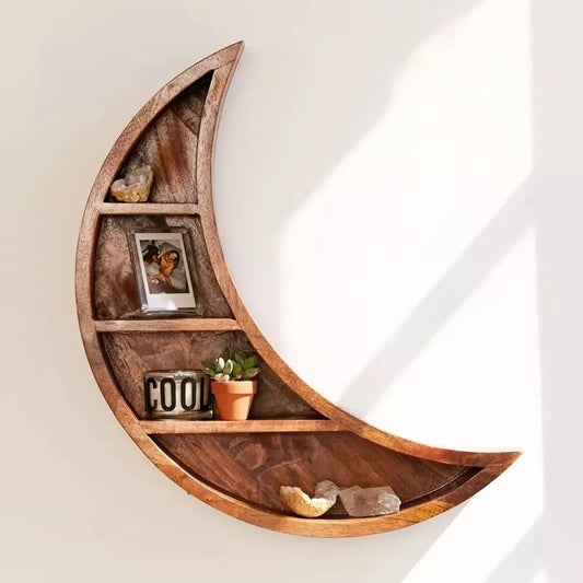 Wooden moon-shaped shelve for Keeps decorative items on a wall.