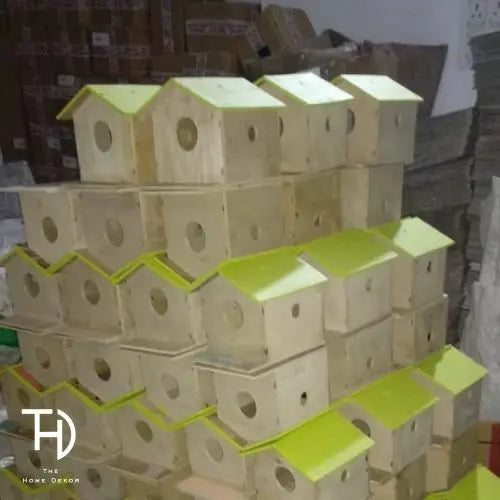 Mdf birdhouse with green roof.
