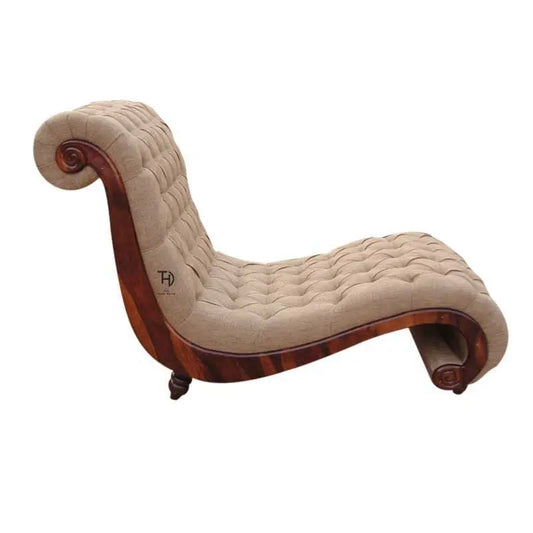 Beige tufted chaise lounge with wooden frame.