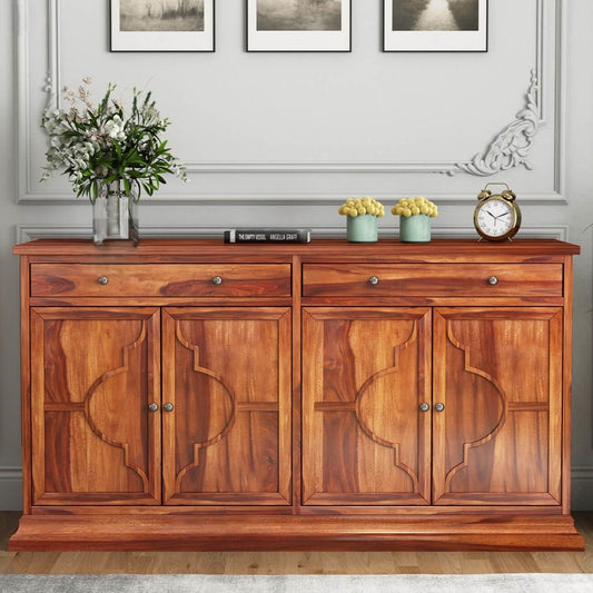 A warm brown wooden sideboard cabinet with carved panel doors, two top drawers, and decorative knobs.