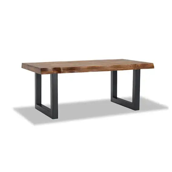 A rectangular sheesham wood dining table with a live edge design on top and black metal legs.