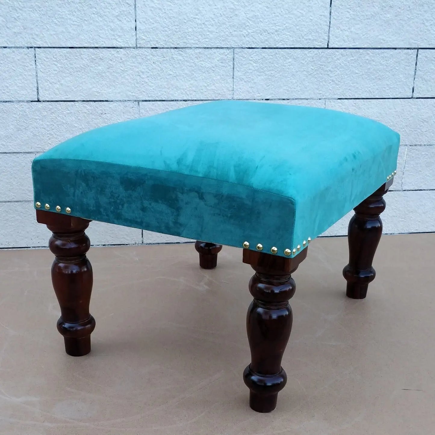 Turquoise stool with wooden Carving legs.