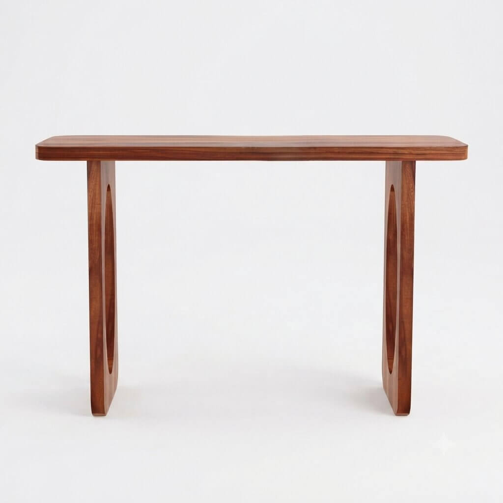 A mid-century modern wooden console table with a warm reddish-brown finish, featuring a rectangular top and two sculptural legs with circular cutouts.