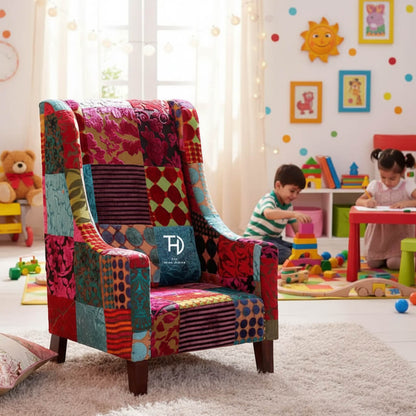 A colorful patchwork fabric kids sofa made with Sheesham wood.