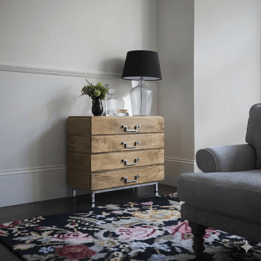 A wooden chest of 4 drawers with a stainless steel base.