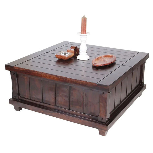 A wooden square coffee table with a dark finish.