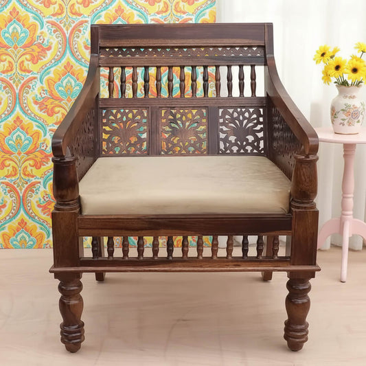 A vintage style sofa chair with natural stain finish on Sheesham wood.
