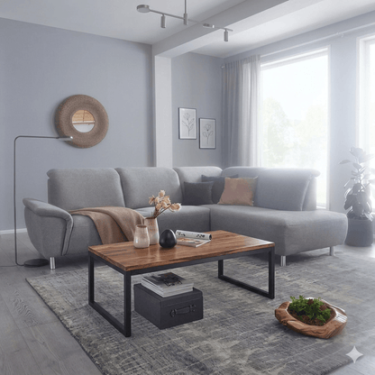 A modern design Marshal coffee table with a Sheesham wood top and metal frame.