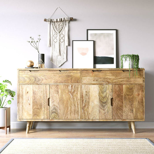 A mid-century modern wooden sideboard cabinet with a natural light wood finish and tapered legs.