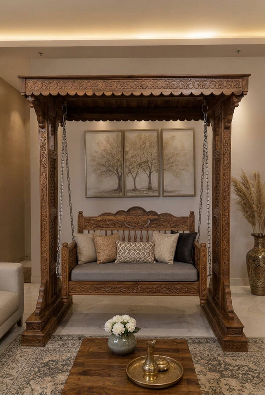 carved wooden hanging swing bench with a gray cushion, made by real sheesham wood