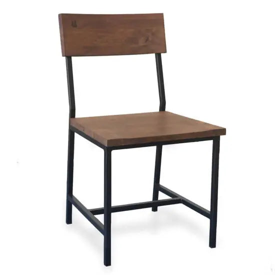 A dining set comprising a rectangular table with acacia wood top, black metal legs, a bench, and a chair. 